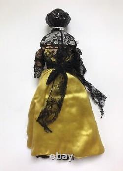 A Victorian/Edwardian Porcelain Dressed Doll