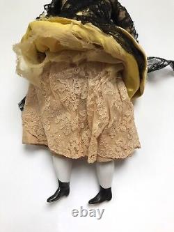 A Victorian/Edwardian Porcelain Dressed Doll