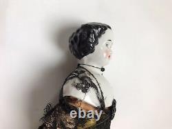 A Victorian/Edwardian Porcelain Dressed Doll