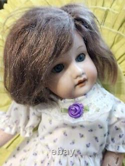 Antique Bisque doll AM Dressed