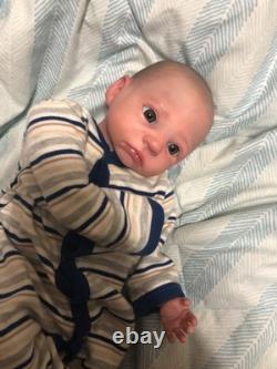Hand painted vinyl reborn baby boy in perfect condition