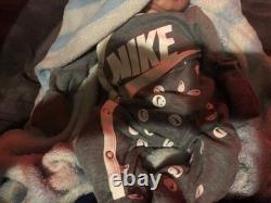 Hand painted vinyl reborn baby boy in perfect condition