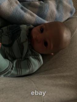Hand painted vinyl reborn baby boy in perfect condition