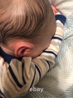 Hand painted vinyl reborn baby boy in perfect condition
