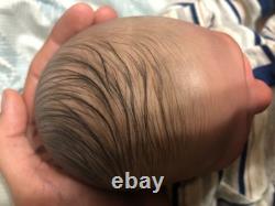 Hand painted vinyl reborn baby boy in perfect condition