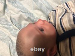 Hand painted vinyl reborn baby boy in perfect condition