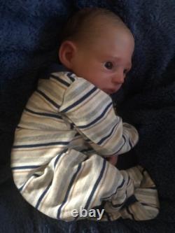 Hand painted vinyl reborn baby boy in perfect condition