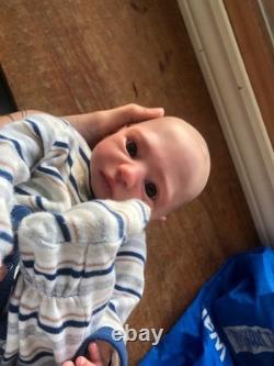 Hand painted vinyl reborn baby boy in perfect condition