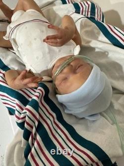 Reborn baby Bam Bam. Preemie baby doll, with COA & multiple outfits. 17 inches