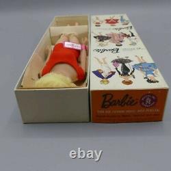 Sidepart Bubblecut vintage Barbie platinum doll from 1965 MIB with wrist tag