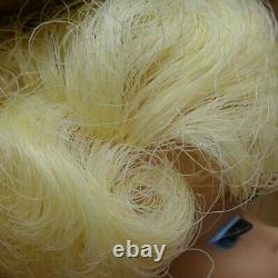 Sidepart Bubblecut vintage Barbie platinum doll from 1965 MIB with wrist tag