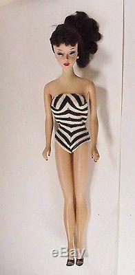 VINTAGE EARLY BRUNETTE PONYTAIL BARBIE with ZEBRA SWIMSUIT AND HIGH HEELS