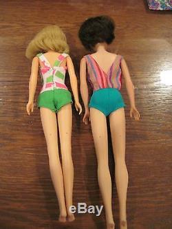 Vintage American Girl Barbie and Francie dolls in case with many Outfits