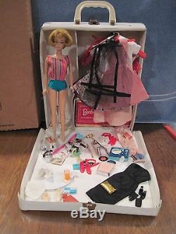 Vintage American Girl Barbie in case with 9 nice outfits