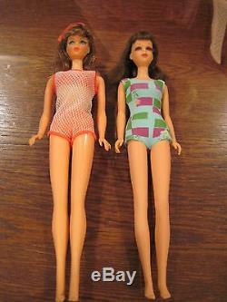Vintage Barbie and Francie dolls in case with 12 Outfits