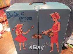 Vintage Barbie and Skipper in case with 18 outfits