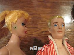 Vintage Ponytail Barbie and Painted Haired Ken in a case with many outfits