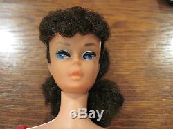 Vintage Ponytail Barbie in a case with many excellent and complete outfits