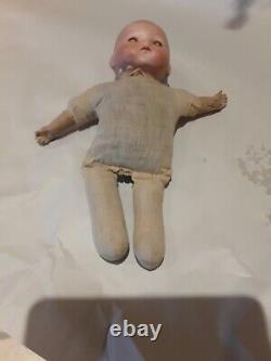 Vintage tiny Armand Marseille infant bisque head doll sleep eyes stuffed body