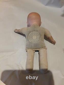 Vintage tiny Armand Marseille infant bisque head doll sleep eyes stuffed body